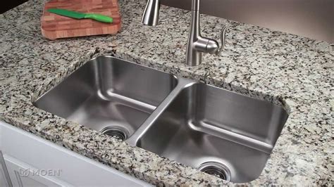 installing stainless steel sink to granite with cabinet brackets|granite under sink attachment.